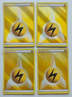 Lot of 4 - Pokemon Lightning Energy 2013 Yellow Reverse Holo LP - Image 1