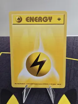 1999 Pokemon TCG Lightning Energy 100/102 Base Set 1st Edition Shadowless Card - Image 1