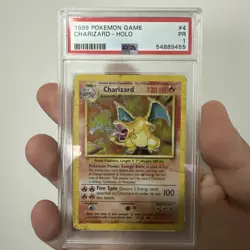 PSA PR 1 Pokemon TCG 1999 Charizard 004/102 Base Set Holo - Image 1