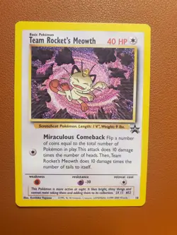 Team Rocket's Meowth 18 Black Star Promo Vintage WOTC NM Pokemon Card - Image 1