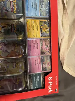 Pokemon TCG Prismatic Evolutions Costco 8 Mini-Tin Bundle W/ Promo Exclusive ￼ - Image 3