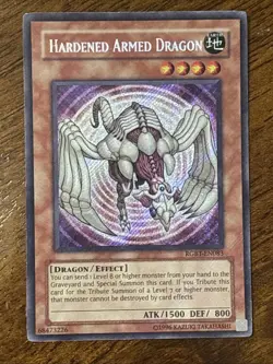 Hardened Armed Dragon RGBT-EN083 Raging Battle-Unlimited Secret Rare LP - Image 1
