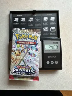 Pokemon Prismatic Evolutions Booster Pack -HEAVY 24.0g- Possible Demi/God Pack! - Image 1