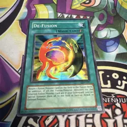 Yugioh TCG - De-Fusion LON-097 - Super Rare Unlimited Edition - NM - Image 1