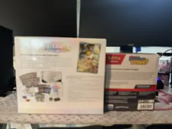 Pokemon TCG Prismatic Evolutions ETB + Surging Sparks Booster Bundle - Image 5