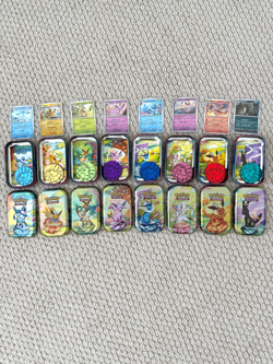 Pokemon Prismatic Evolutions Eeveelutions Costco Tins Promo cards Coins NO PACKS - Image 1