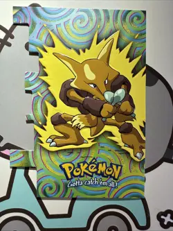 Pokemon TV Series 2 Topps - Die-Cut Embossed Chase Card #65 Alakazam EV9 - Image 1