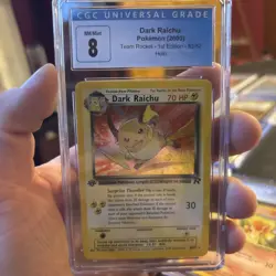 2000 POKEMON ROCKET 1ST EDITION #83 DARK RAICHU HOLO CGC 8 - Image 1