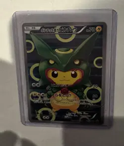 Pokemon 2016 Poncho Wearing Pikachu Rayquaza 230/XY-P Holo Promo Japanese - Image 1