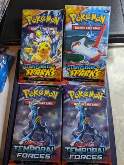 2 Surging Sparks Boosters 2 Temporal forces boosters Bundle Pokemon Cards - Image 1