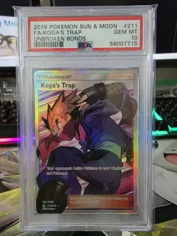 2019 POKEMON SUN & MOON UNBROKEN BONDS #211 FULL ART/KOGA'S TRAP PSA 10 - Image 1