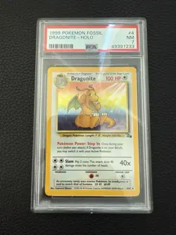 1999 Pokemon Fossil Unlimited Dragonite Holo Rare Card 4/62 Graded PSA 7 - Image 1