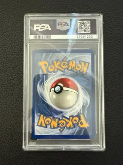 1999 Pokemon Fossil Unlimited Dragonite Holo Rare Card 4/62 Graded PSA 7 - Image 2