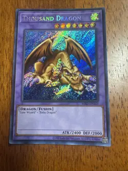 Yu-Gi-Oh! Thousand Dragon - 25th Anniversary Ed. Secret Rare (MRD-EN143) - Image 1