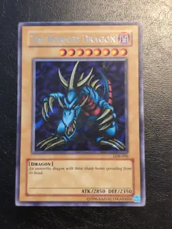 Yu-Gi-Oh! SECRET RARE HOLO CARD TRI-HORNED DRAGON LOB-000 VLP - Image 1