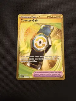 Pokemon - Counter Gain - 249/191 - SV08: Surging Sparks - Gold - NM - Image 1