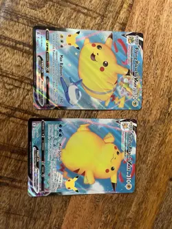 Pokemon TCG Holo Ultra Rare Flying And Surfing Pikachu VMAX - Image 1