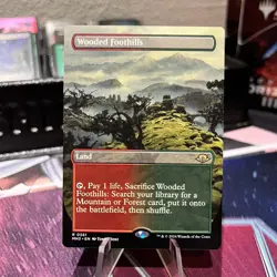 Wooded Foothills 0361 (Borderless) NM - Modern Horizons 3 (MH3) - Image 1