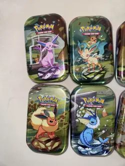 SET OF 8 EMPTY Pokemon Prismatic Evolutions Mini Tins No Contents No Cards - Image 2