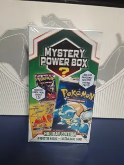 Pokemon Tcg Mystery Box Holiday Edition w/4 Booster Packs and 1 ultra rare card - Image 1