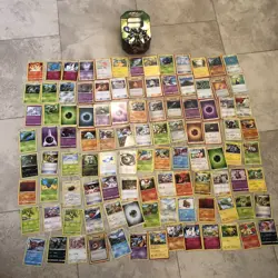 Pokemon Card Lot Of 100 With Collectors Tin Mixed Years Energy & Trainers - Image 1