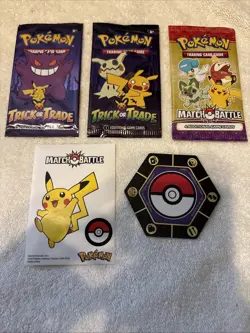 3 Unopened Packs Of Pokemon Cards With Match Battle Sticker & Game Piece - Image 1
