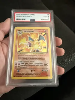 1999 POKEMON BASE SET UNLIMITED #4 CHARIZARD-HOLO PSA 4 - Image 1