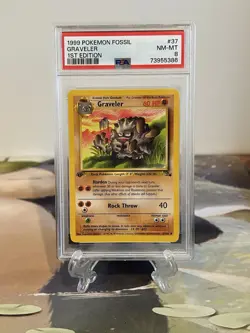 Pokemon Card 1st Edition Graveler - Fossil Set No. 37/62 - PSA 8 NM-MT - Image 1