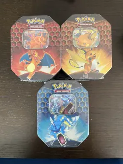 Set of 3 Pokemon Hidden Fates GX Tins Charizard Gyarados and Raichu Sealed - Image 1