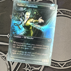 Nadier's Nightblade (Borderless) - Commander Masters (CMM) FOIL - Image 1