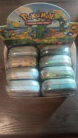 Pokemon Celebrations 8 Sealed Mini Tins with Open Display Box - Image 1