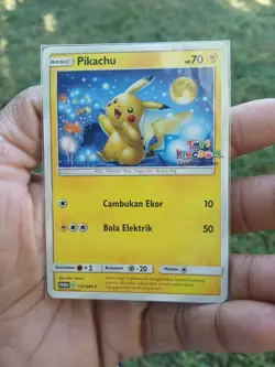 Pikachu 172/SM-P TOYS KINGDOM Promo Indonesia Pokemon Card NM “Creating Smiles” - Image 1