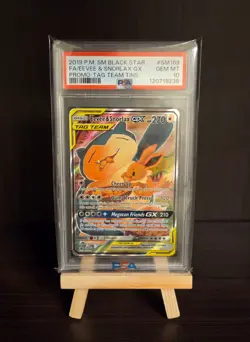 Pokemon TCG | Eevee & Snorlax SM169 | ENG | Promo Tag Team | PSA 10 GEM MT - Image 1