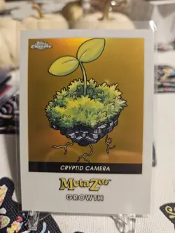 Metazoo Topps Chrome Growth Cryptid Camera Gold Refractor 49/50 Card #147-F - Image 1