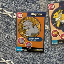 PokeTrivia Card #112 RHYDON, 1999 Burger King, Pokemon Movie Collectible Scene 8 - Image 1