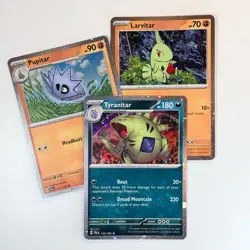 Tyranitar, Pupitar & Larvitar (Cosmic Holo) - Pokemon Triple Whammy Tin Set - Image 1