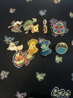 Lot Of 8 Pokemon Enamel Pins, Eevee, Starters, Eeveelutions, Gym Badges - Image 1