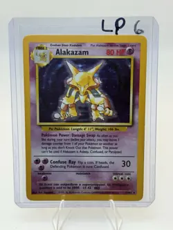 Pokemon TCG Alakazam Base Set Holo Card 1/102 Unlimited Holo Rare, LP Condition - Image 1