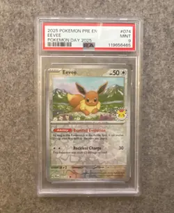 2025 POKEMON PRE EN-PRISMATIC EVOLUTIONS POKEMON DAY 2025 #074 EEVEE PSA 9 - Image 1