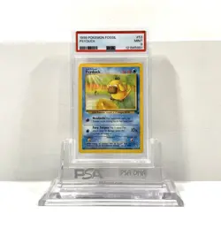 PSYDUCK 53/62 - FOSSIL 1999 POKEMON CARD - FRESH SLAB - POP 324 - PSA 9 MINT - Image 1