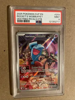 2025 POKEMON SVP EN-SV BLACK STAR PROMO #203 TEAM ROCKET'S WOBBUFFET PSA 9 - Image 1