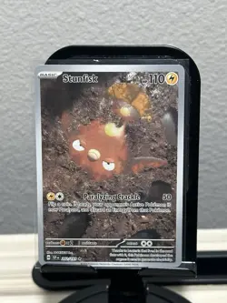 Stunfisk 202/191 Surging Sparks Pokemon Illustration Near Mint Condition - Image 1