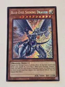 Blue-Eyes Shining Dragon LCKC-EN008 Secret Rare Yugioh Holo Foil Bleed LP - Image 1