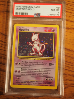 Pokemon 1999 Base Unlimited Mewtwo rare holo card, PSA 8 - Image 1
