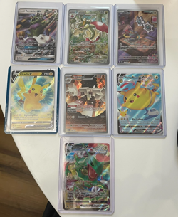 Pokemon Card Lot (7) - NM Condition - Pikachu V, Rayquaza VMAX, Flying Pikachu V - Image 1