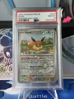 2025 POKEMON PRE EN-PRISMATIC EVOLUTIONS POKEMON DAY 2025 #074 EEVEE PSA 9 - Image 1