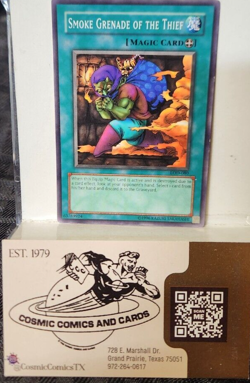 YuGiOh! TCG Smoke Grenade of the Thief Legacy of Darkness LOD-080 1st Edition - Image 1