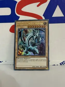 YUGIOH BLUE EYES WHITE DRAGON ULTRA RARE LCKC-EN001 1ST EDITION LOB ART - Image 1