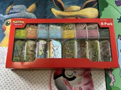 Pokemon Prismatic Evolutions Mini Tin 8-Pack With Promo Cards Costco - Image 1