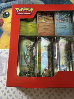 Pokemon Prismatic Evolutions Mini Tin 8-Pack With Promo Cards Costco - Image 2
